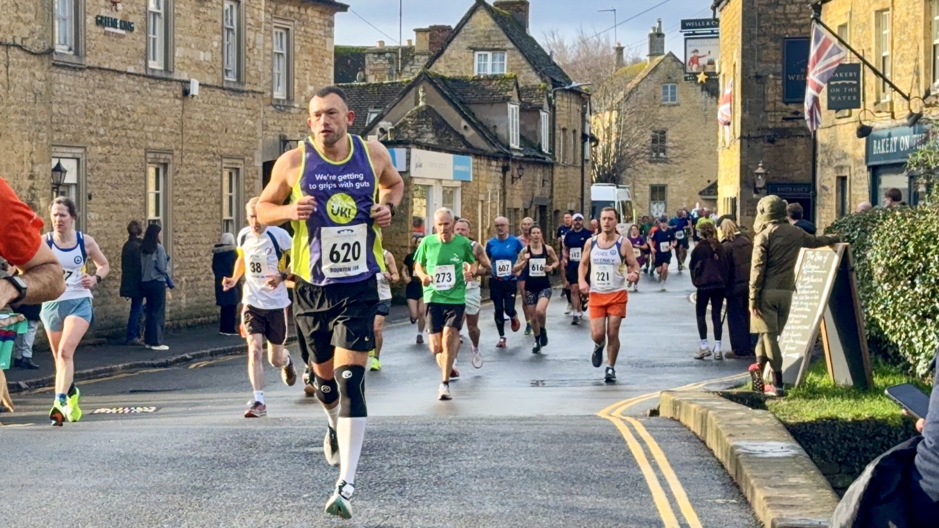 Danny Smith running in a Guts UK top